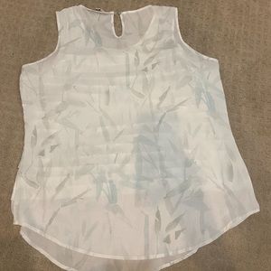 Sleeveless blouse.  Etcetera brand. Never worn